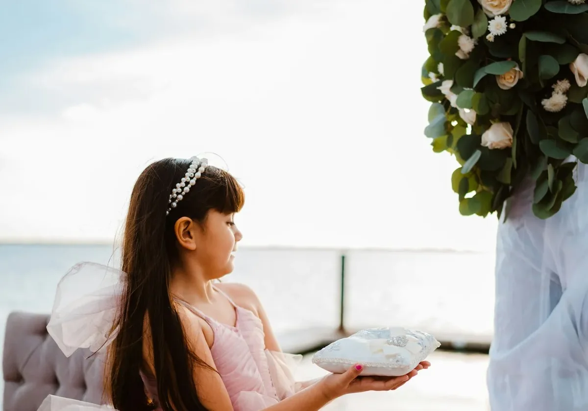 A child in pink at a family ceremony